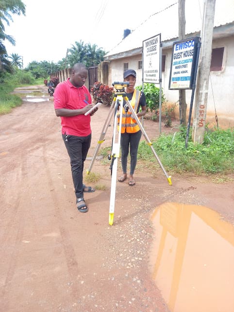 Surveyors on road project